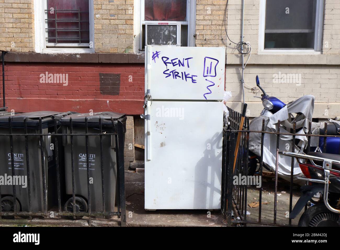 A Rent Strike hashtag on a refrigerator in Brooklyn, New York. Layoffs due to the coronavirus... SEE MORE INFO FOR FULL CAPTION Stock Photo