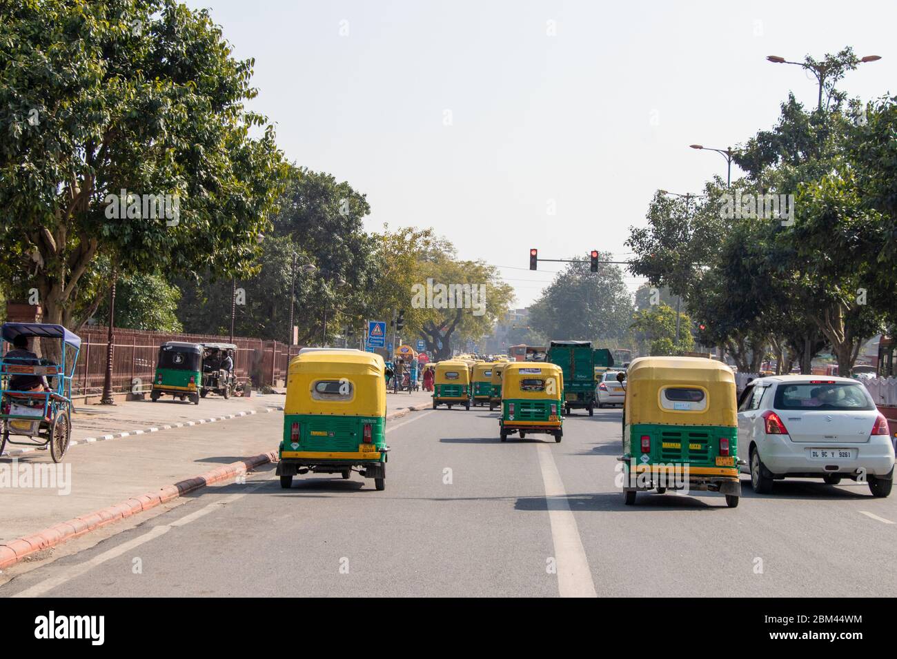 New Delhi, India - Feb, 2019. Auto Rickshaw running on busy road. Stock Photo