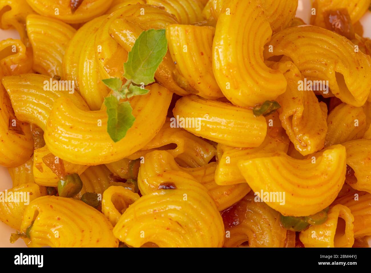 Macaroni pasta delicious indian style recipe or dish Stock Photo - Alamy