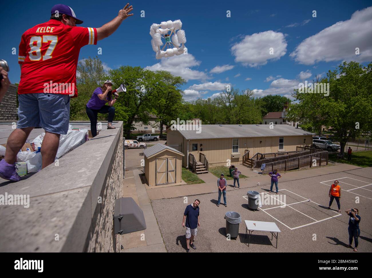 Manhattan, Kansas, USA. 6th May, 2020. From left, JOSH RUNYAN drops a