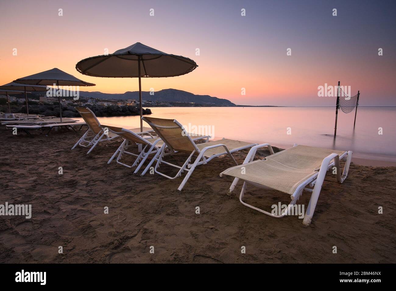 Umbrellas on the beach, Crete, Greece. Stock Photo