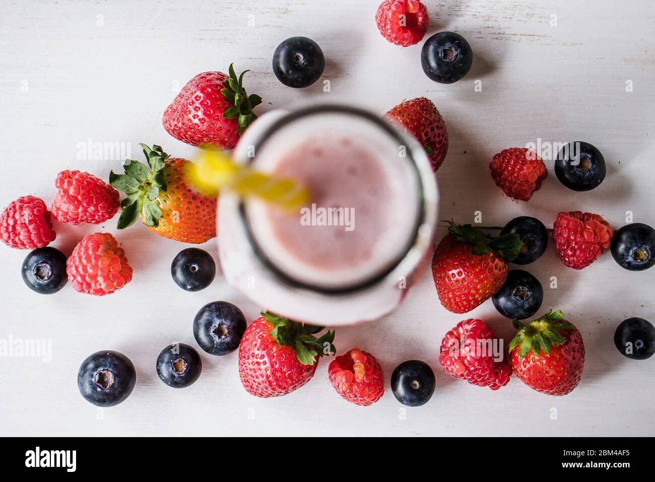 Strawberry, raspberry, blueberry and blackberry on white background Stock Photo