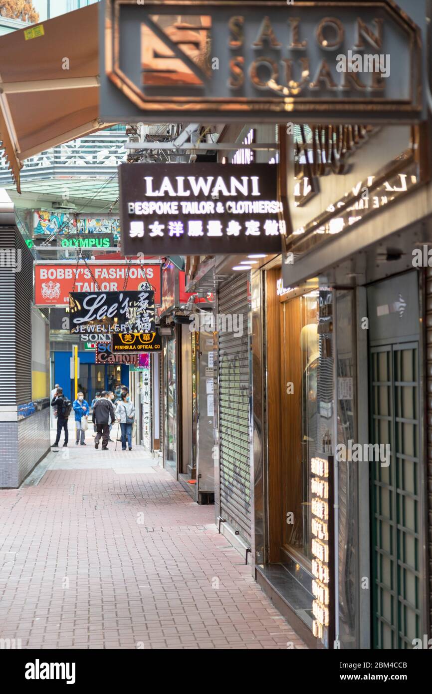 People walking along Carnarvon Road, Tsim Sha Tsui, Hong Kong Stock