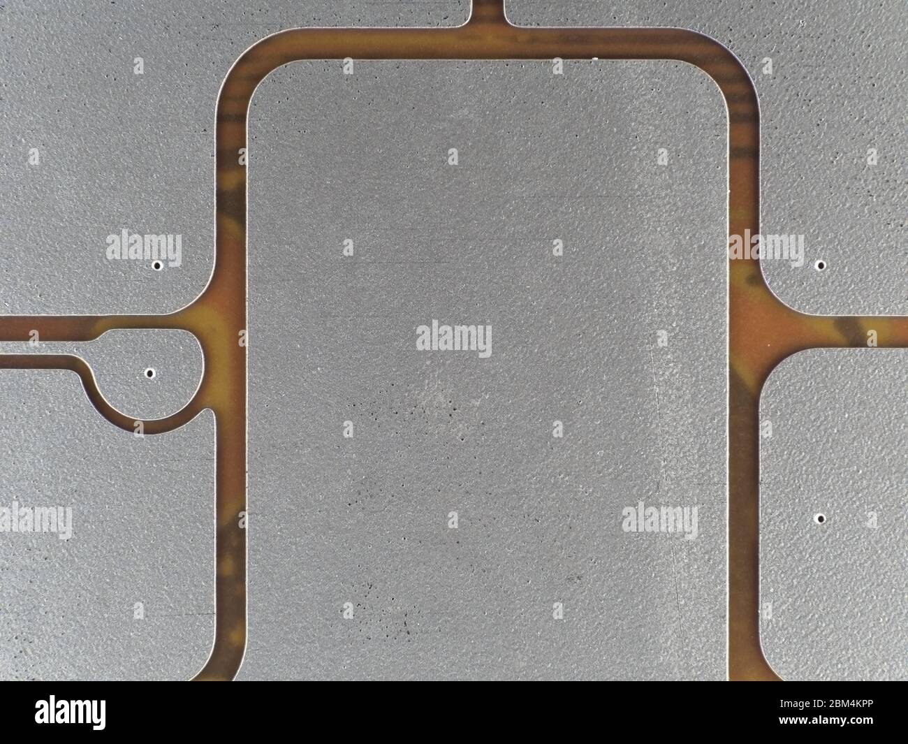 Credit card chip contacts under low-power microscope Stock Photo