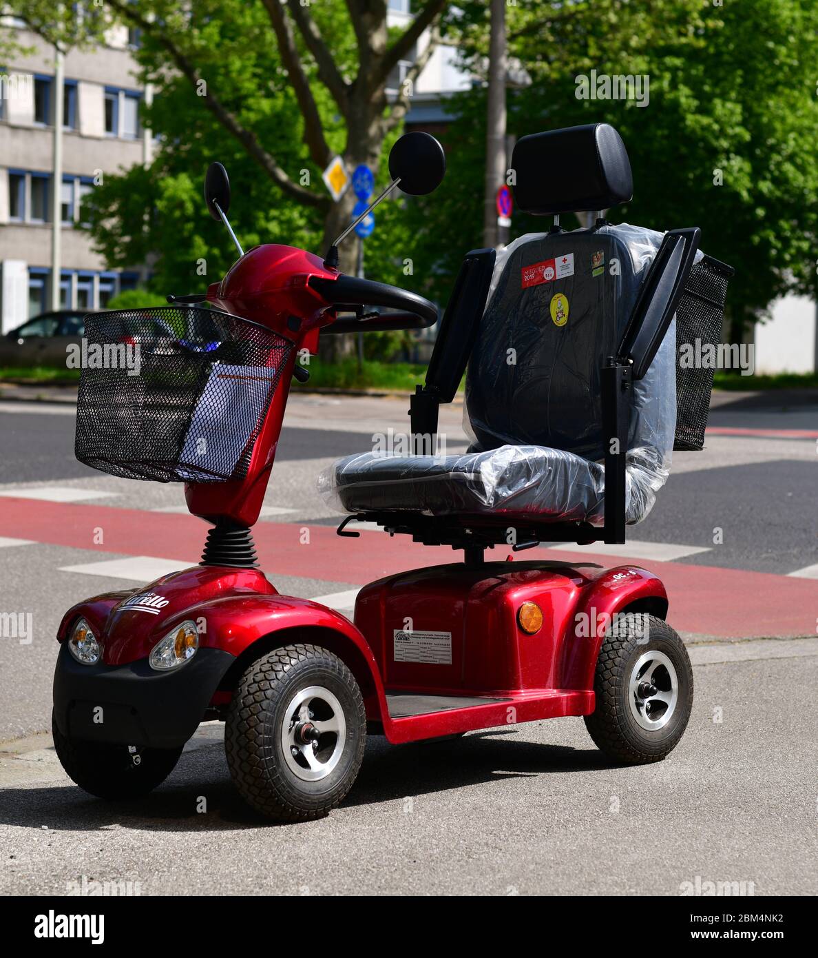 Mobility scooter der marke Graf Carello for disabled or elderly people  paked on a street. Austria, Europe Stock Photo - Alamy