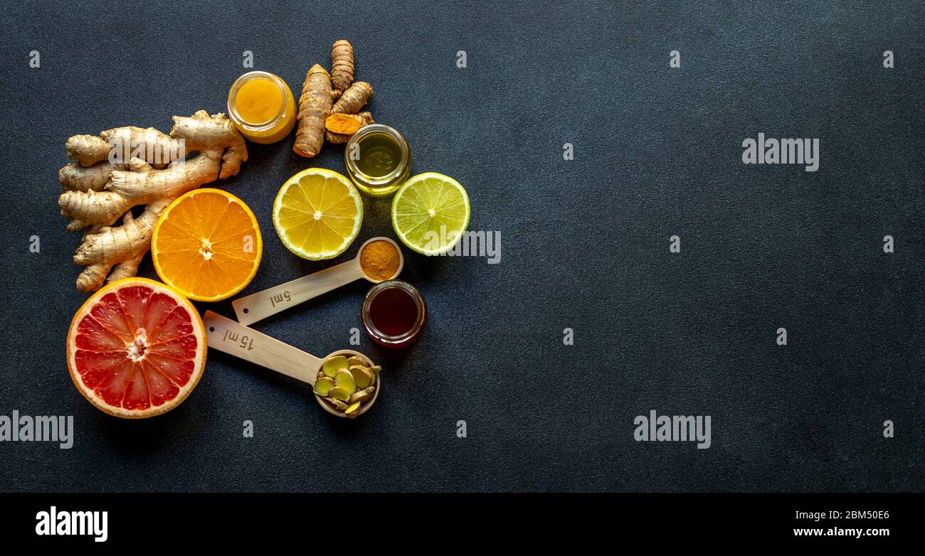 Healthy ingredients for boosting immunity - ginger, turmeric, citruses, and honey Stock Photo