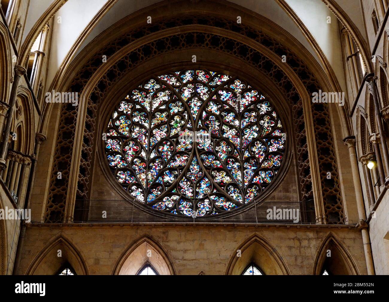Stained glass in the rose window of the south transept of the magnificent Lincoln  Cathedral, Lincoln, England Stock Photo - Alamy