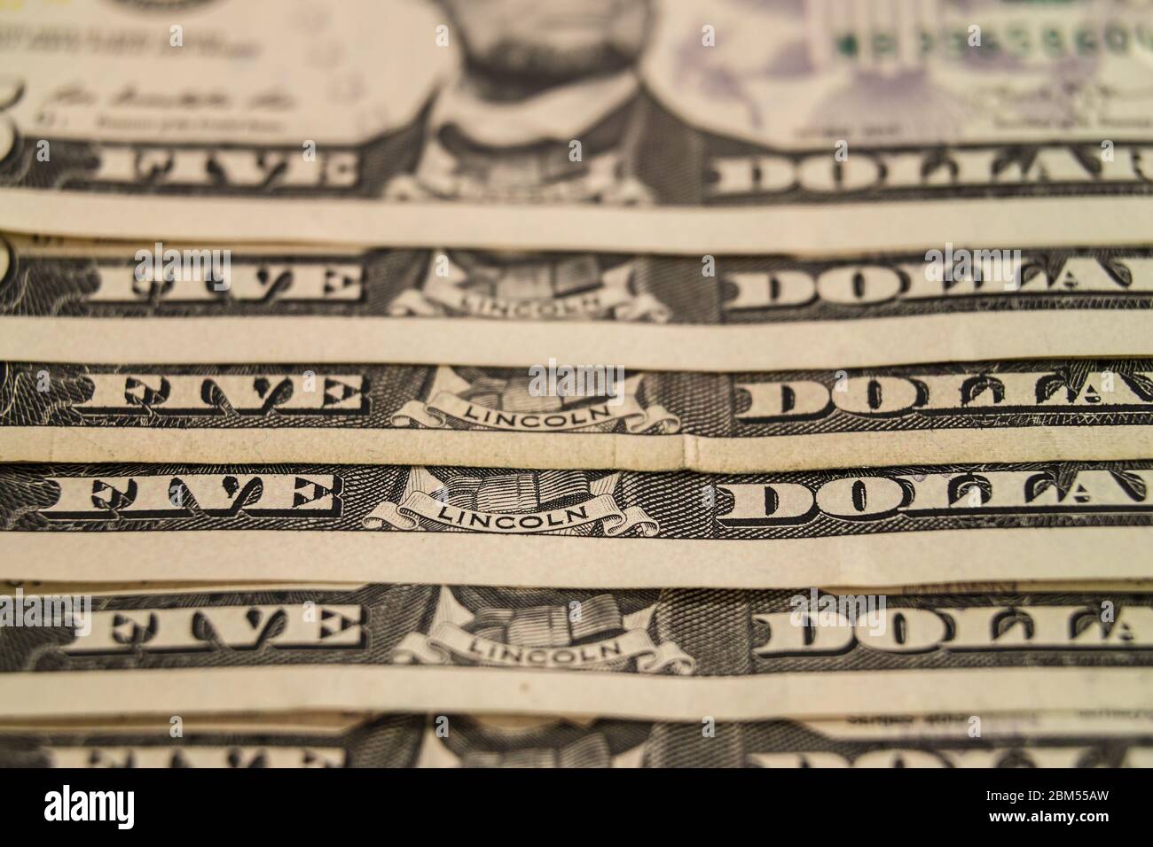 Background from Paper Money Five United States Dollars Stock Photo