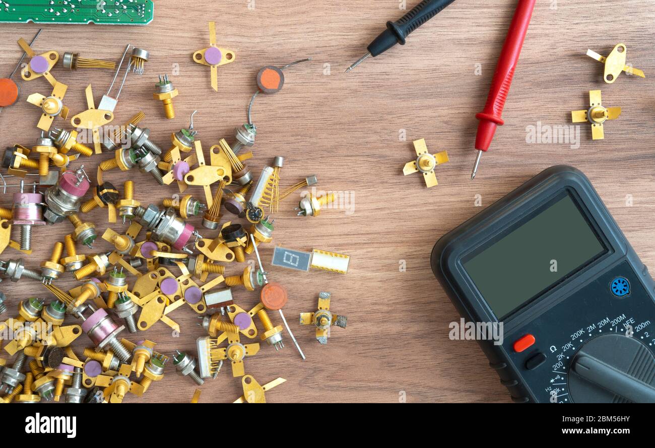 Multimeter and power supply cables. conducting tests and electrical measurements. electronics repair.  Stock Photo