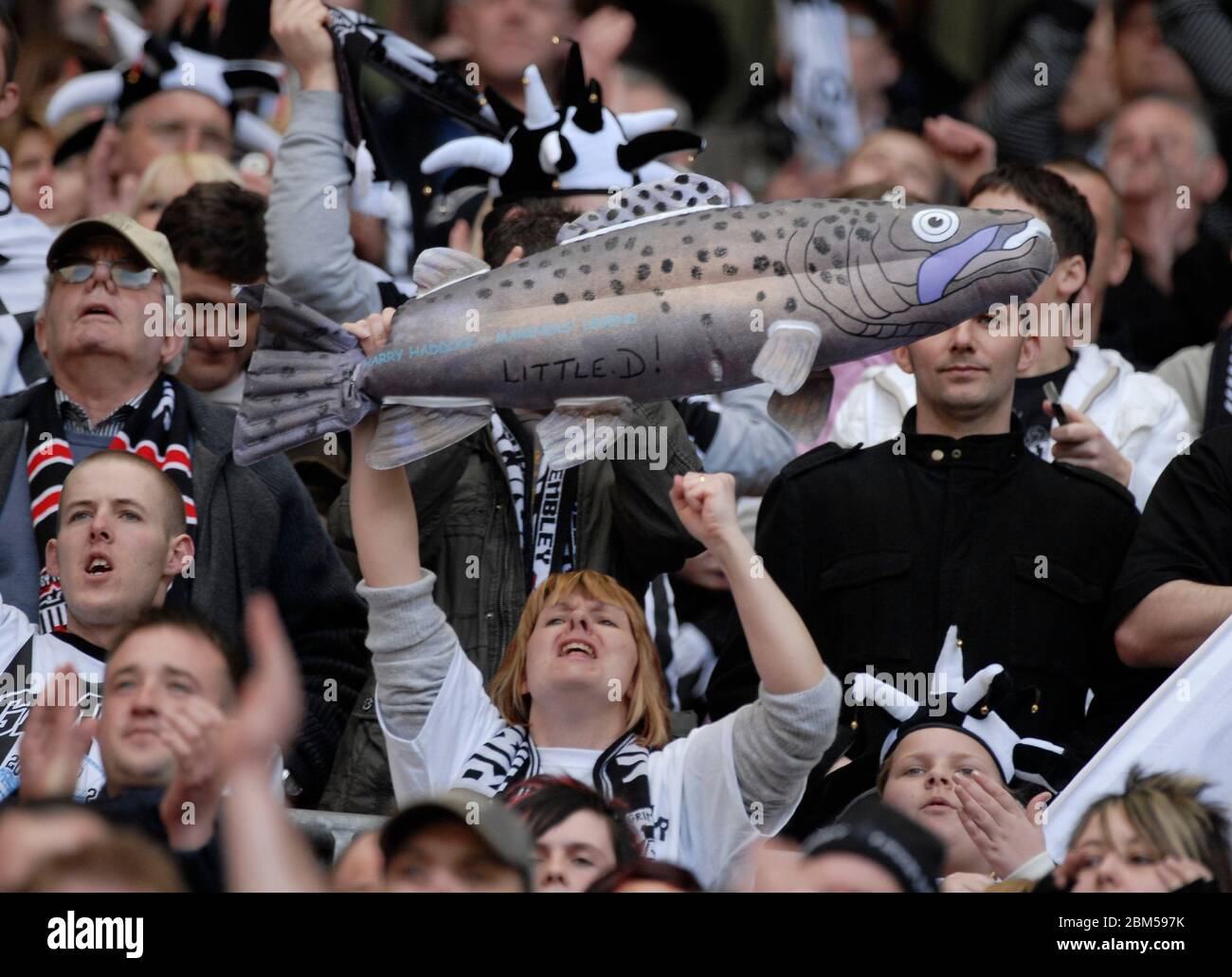 London, UK MARCH 30: Grimsby Town Fans show of the famous fish from Grimsby during Johnstone's Paint Trophy Final  between Grimsby Town against MK Don Stock Photo