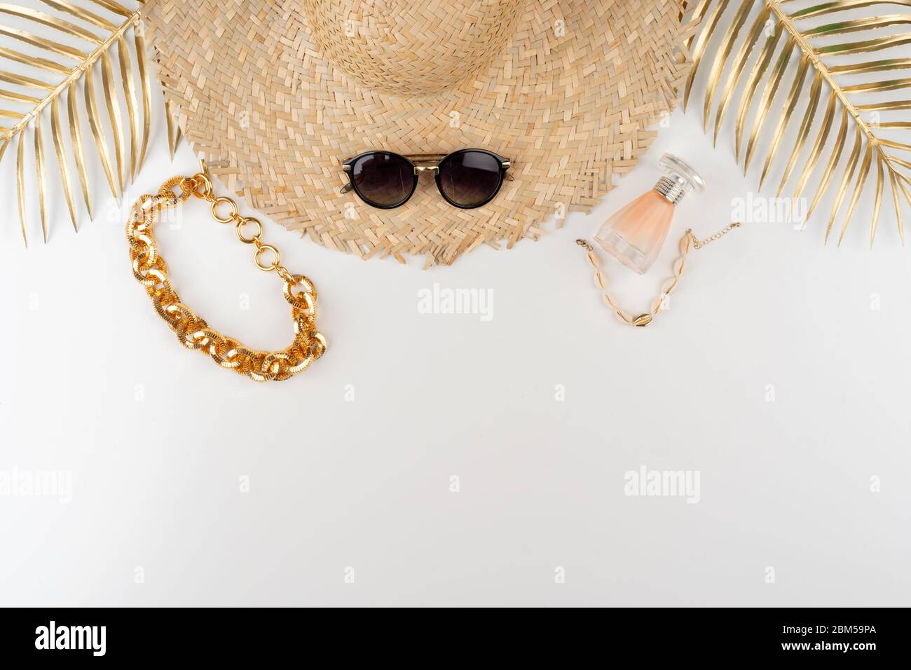 Straw hat and sunglasses top view on white background Stock Photo - Alamy