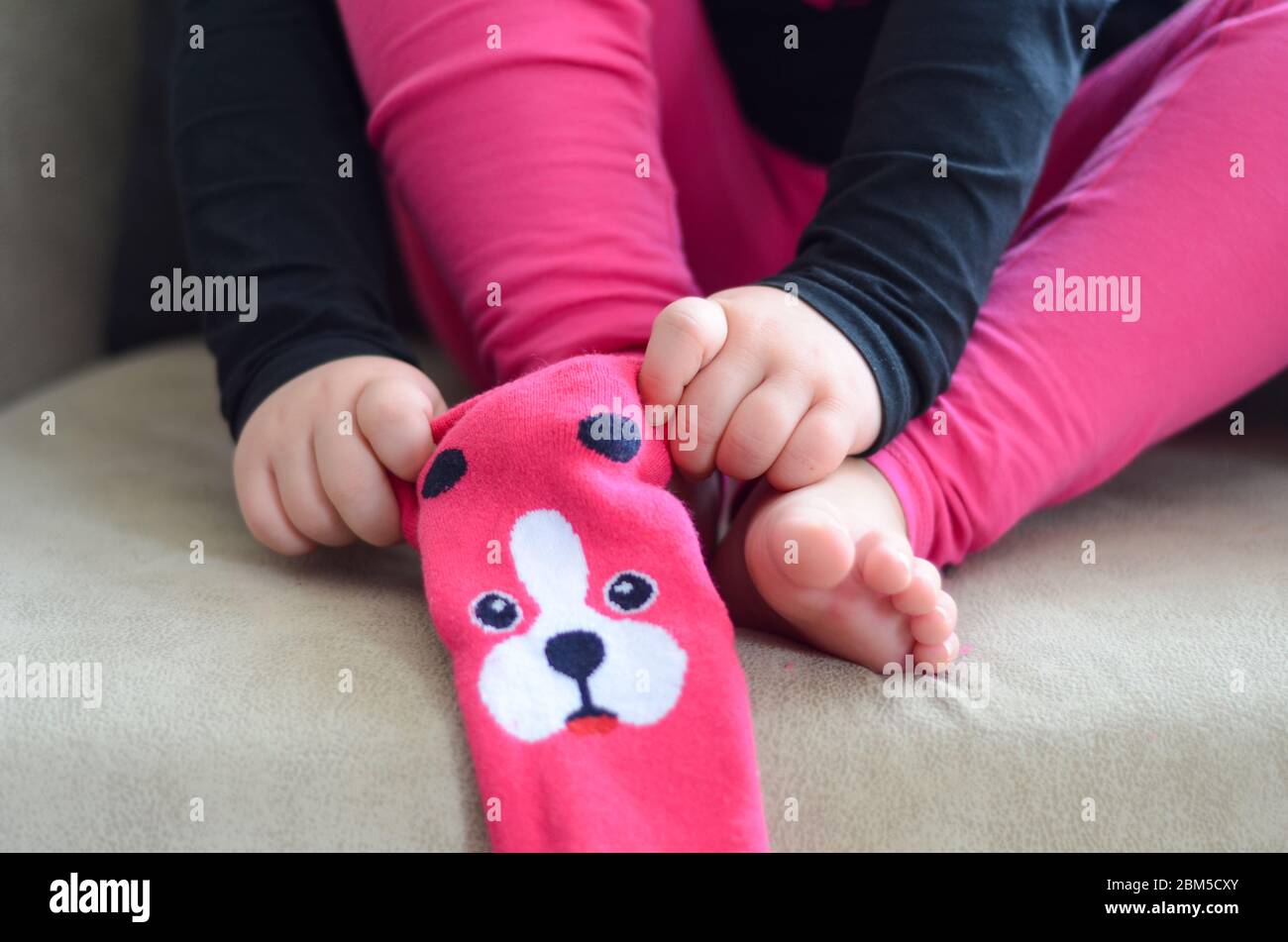 The child is wearing on the sock Stock Photo Alamy