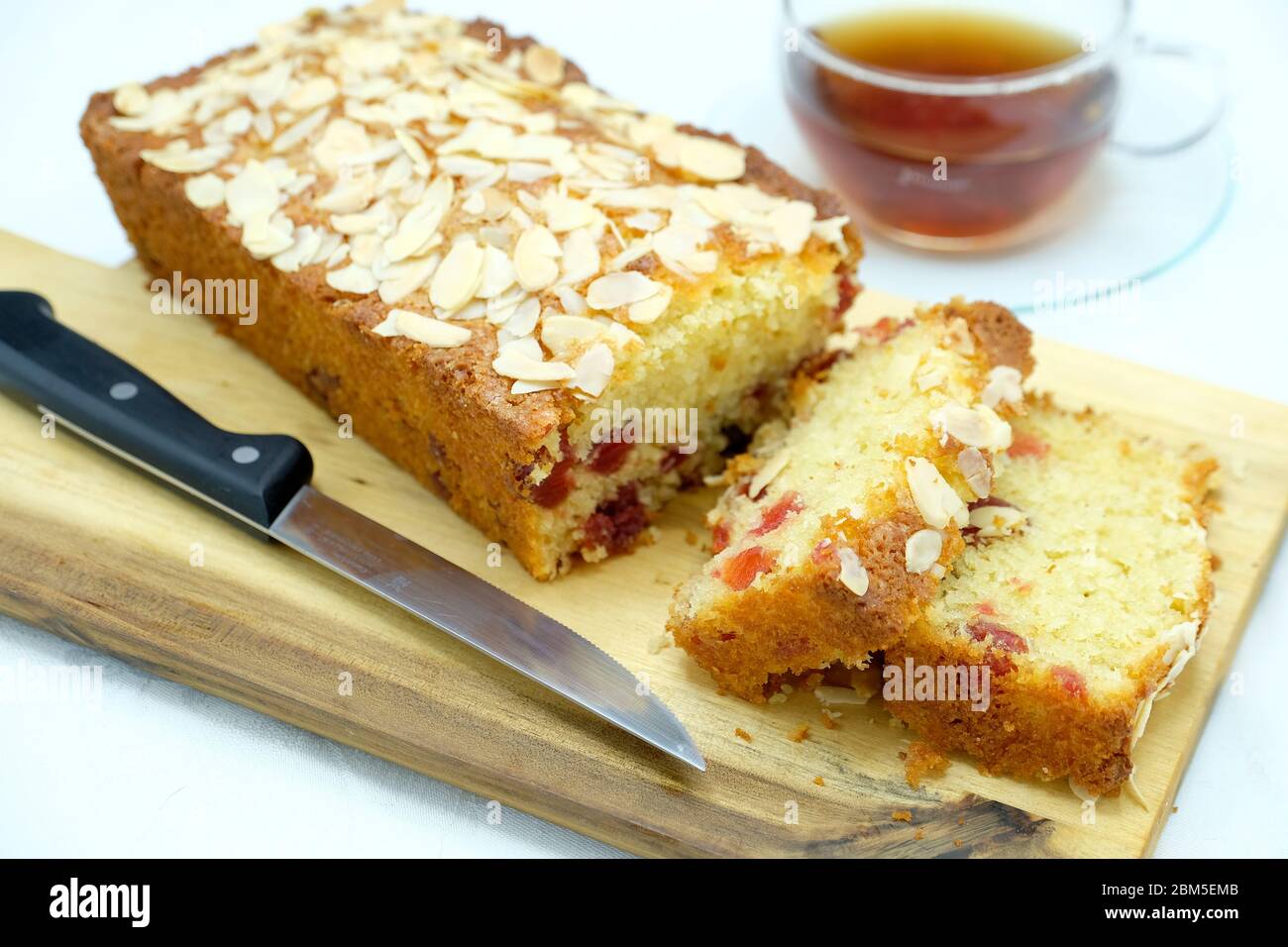 Homebaked cherry and coconut loaf cake Stock Photo Alamy