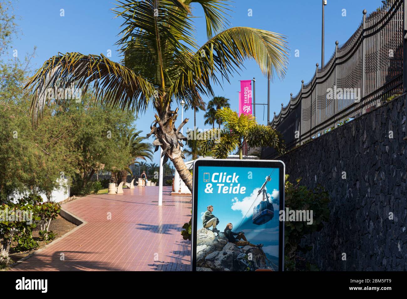 Poster advertising trips on the cable car to the top of Teide volcano on the promenade in Playa fanabe during the Covid 19 State of Emergency in Costa Stock Photo