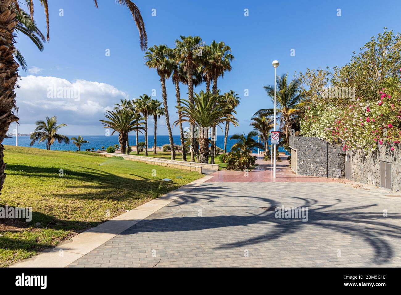 Pathway from Calle Unterhacing to the coastal walkway empty during the Covid 19 State of Emergency in Costa Adeje, Tenerife, Canary Islands, Spain Stock Photo