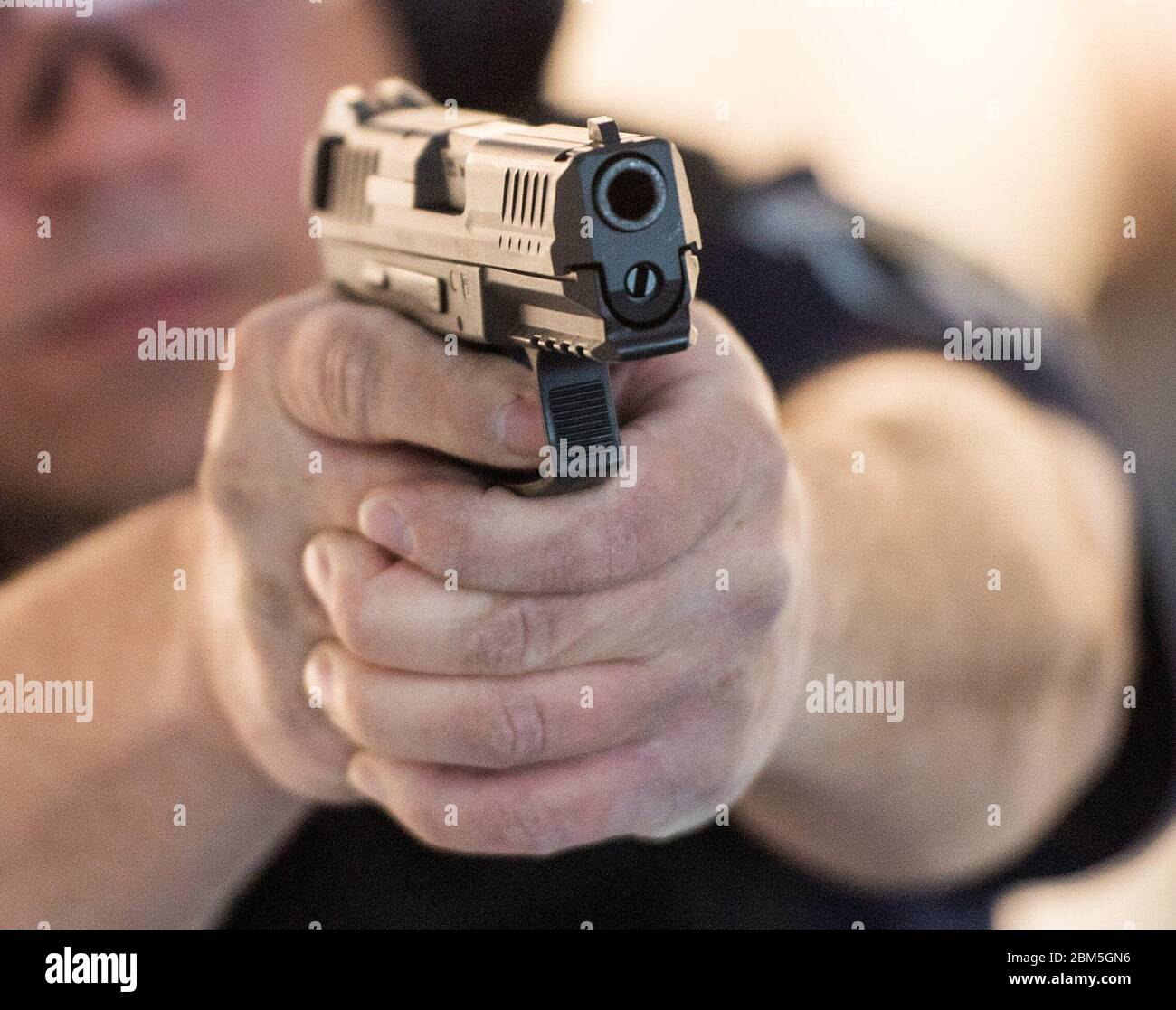 Berlin Germany 07th May A Police Officer Is Practising With A Pistol On A Shooting Range During The Commissioning Of The Modular Room Shooting Range Of The Berlin Police Credit Christophe