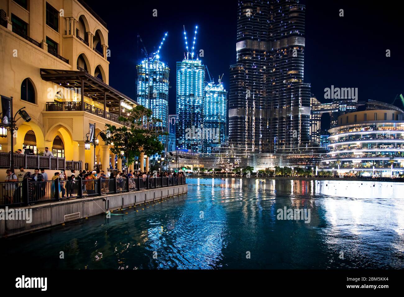 Dubai, United Arab Emirates - December 20, 2019: Crowded Dubai mall fountain show area full with tourists and visitors as one of the main travel attra Stock Photo