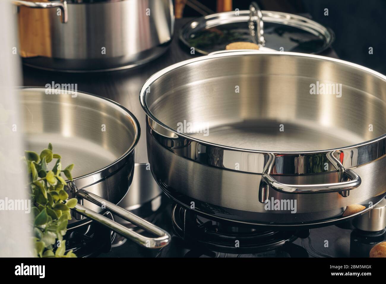 Frying pan on the gas stove in a kitchen Stock Photo Alamy