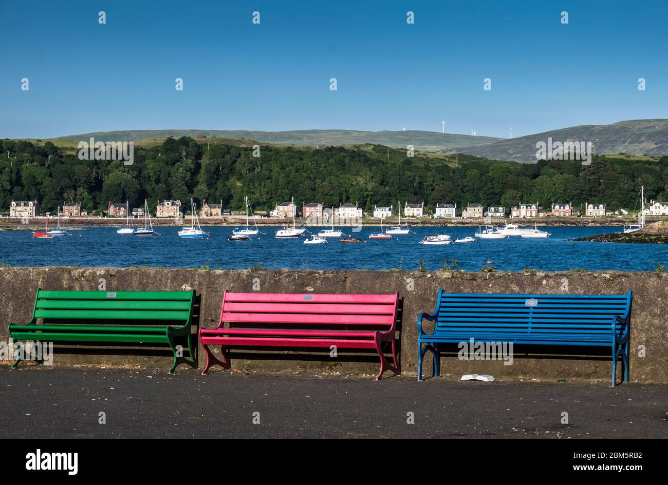 red green blue benches, rgb,great cumbrae, milport Stock Photo