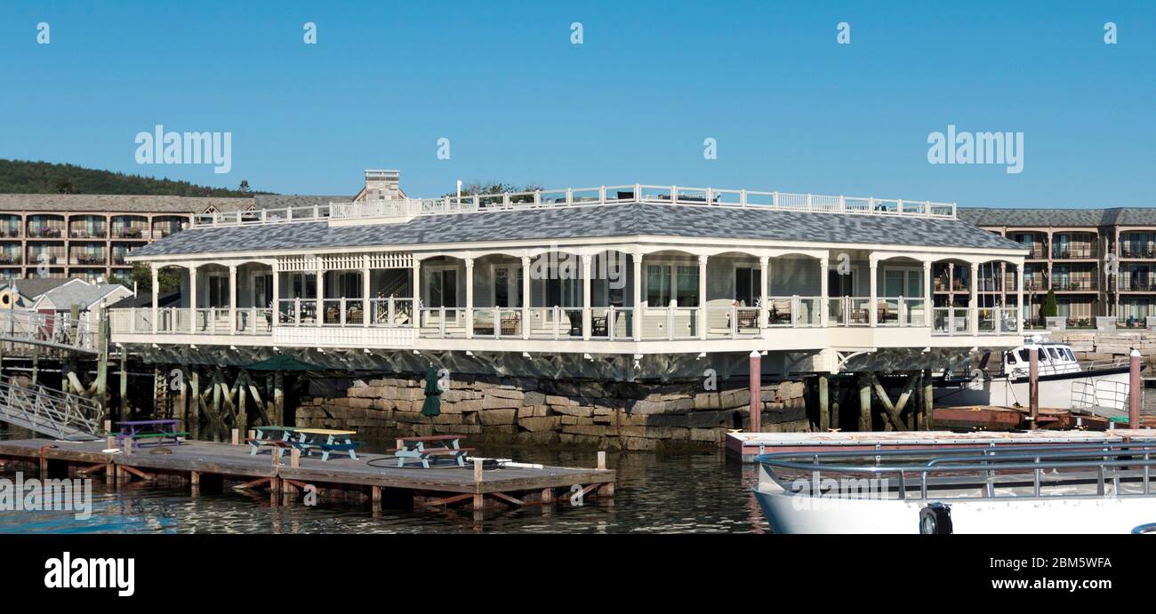 Luxury hotel rooms hang over the water and offer unbelievable views in Bar Harbor Maine. Stock Photo