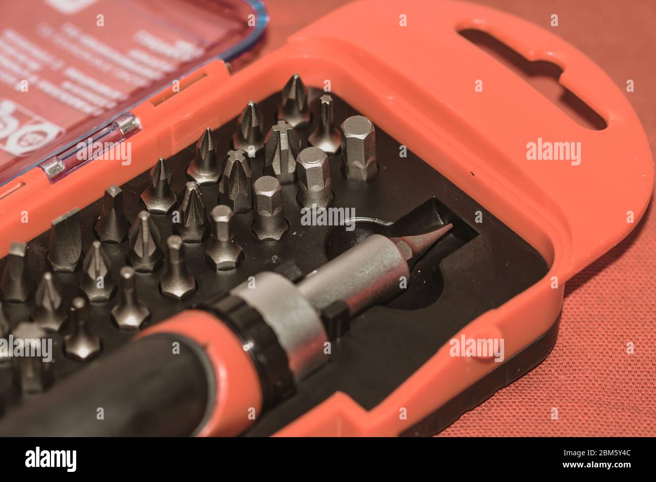 Close up of interchangeable screwdriver set with different types of