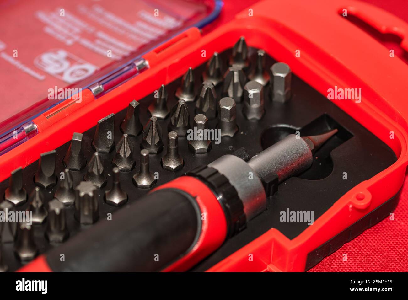 Close up of interchangeable screwdriver set with different types of