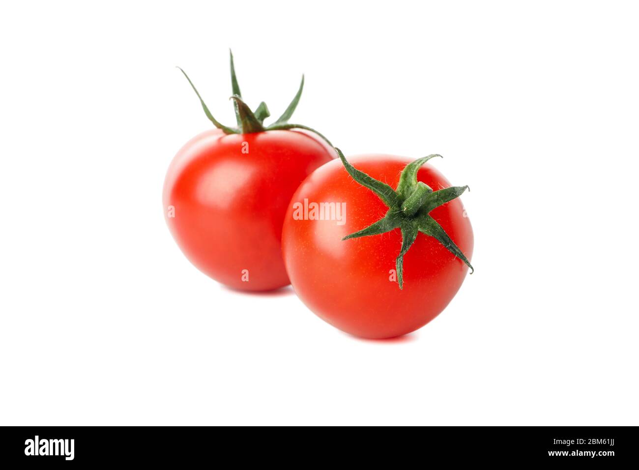 Fresh red tomatoes isolated on white background Stock Photo - Alamy