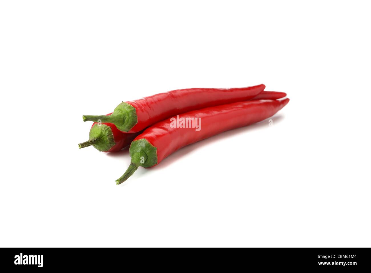 Tasty red chilli peppers isolated on white background Stock Photo - Alamy