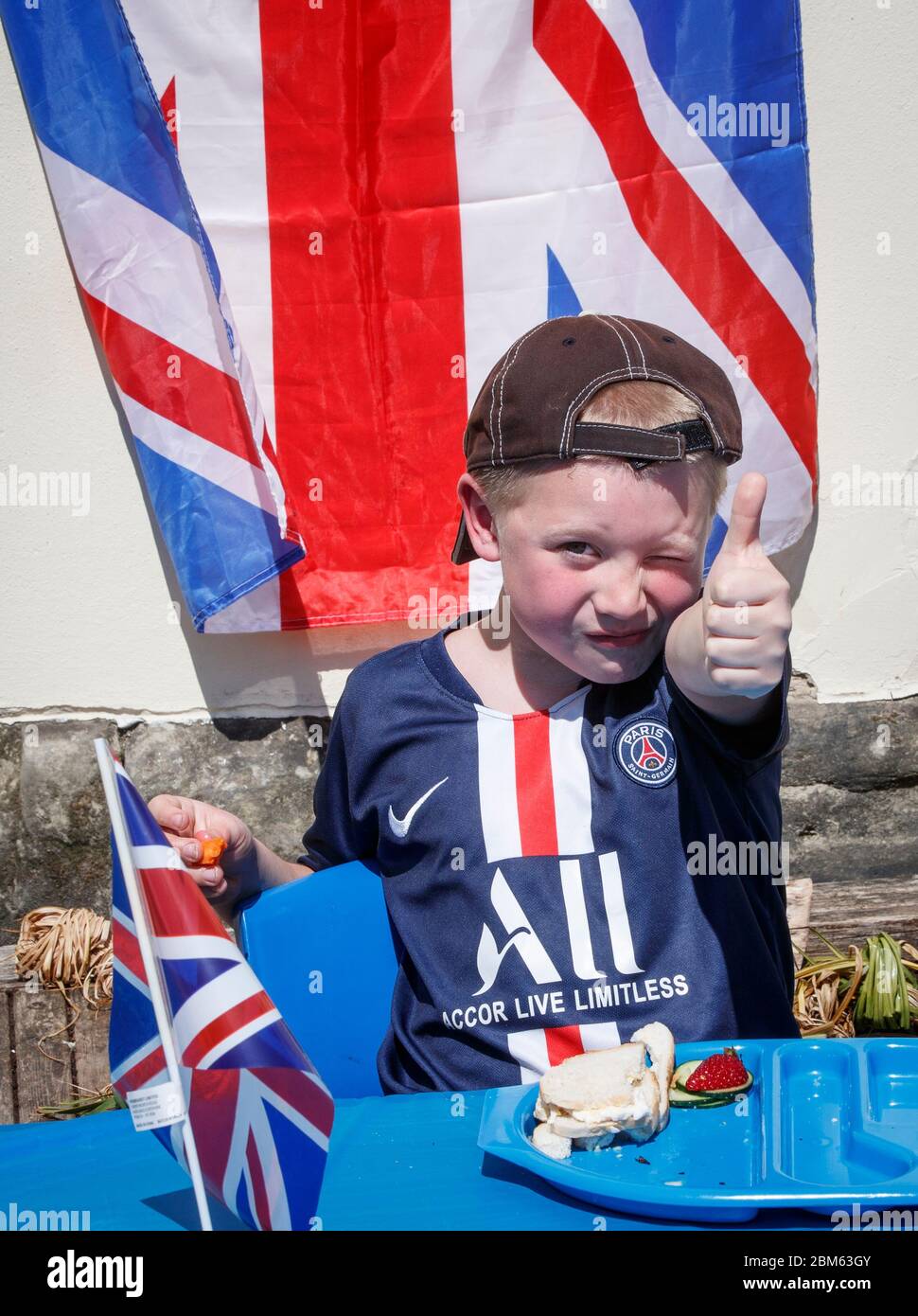 A child at Breadsall Primary School in Derby during a VE Day lunch party to mark the 75th anniversary of the end of the Second World War in Europe. Stock Photo