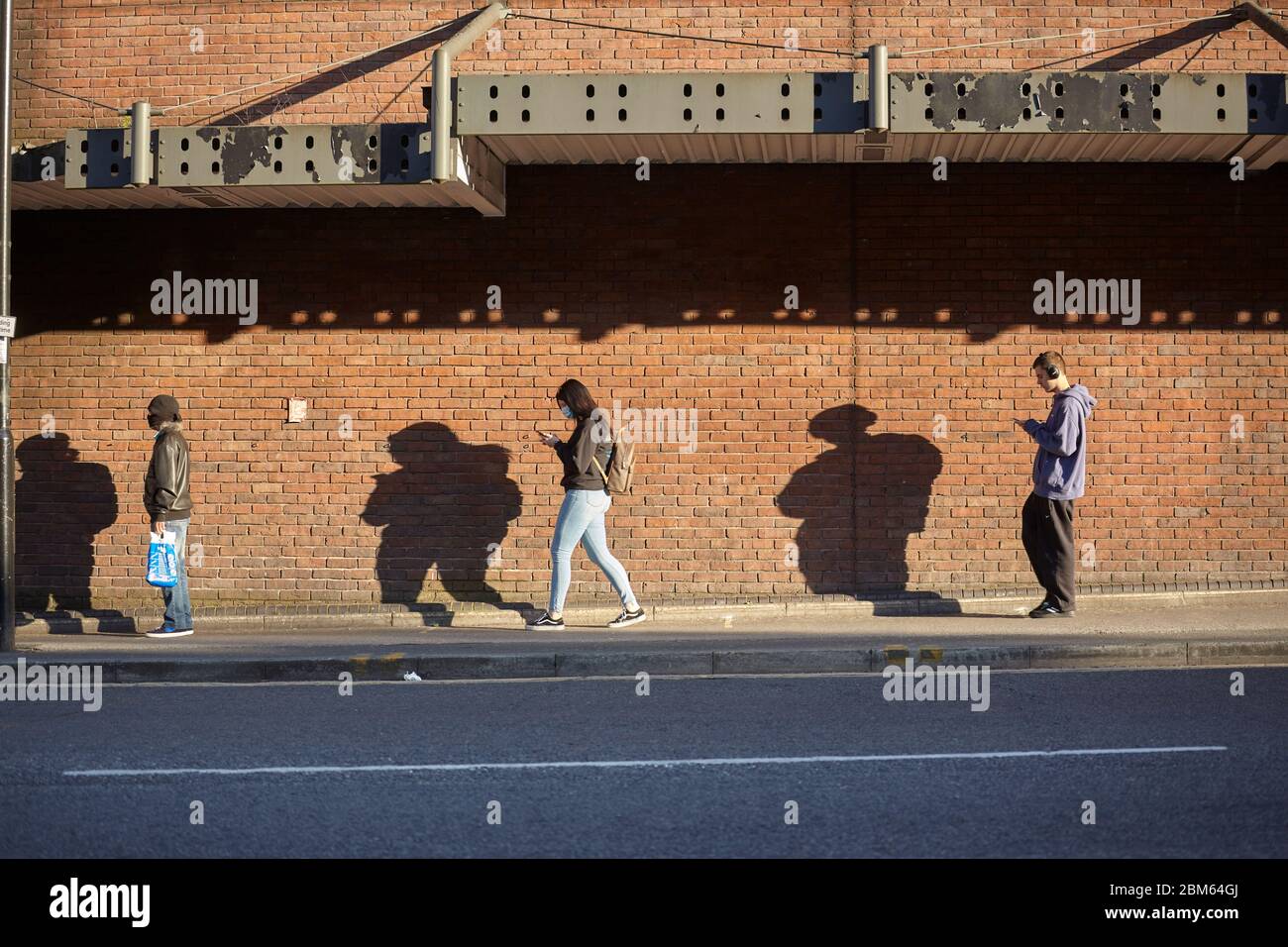 People queuing at Sainsbury's in Angel during the Covid-19 outbreak, May 2020, London Stock Photo