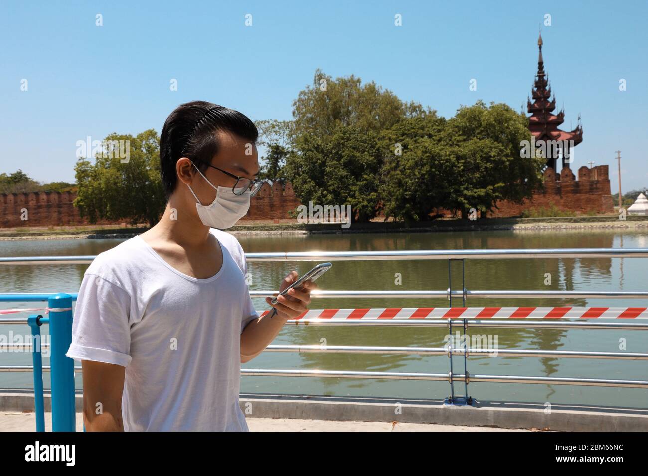 Man wearing hygienic mask to prevent infection. Stock Photo