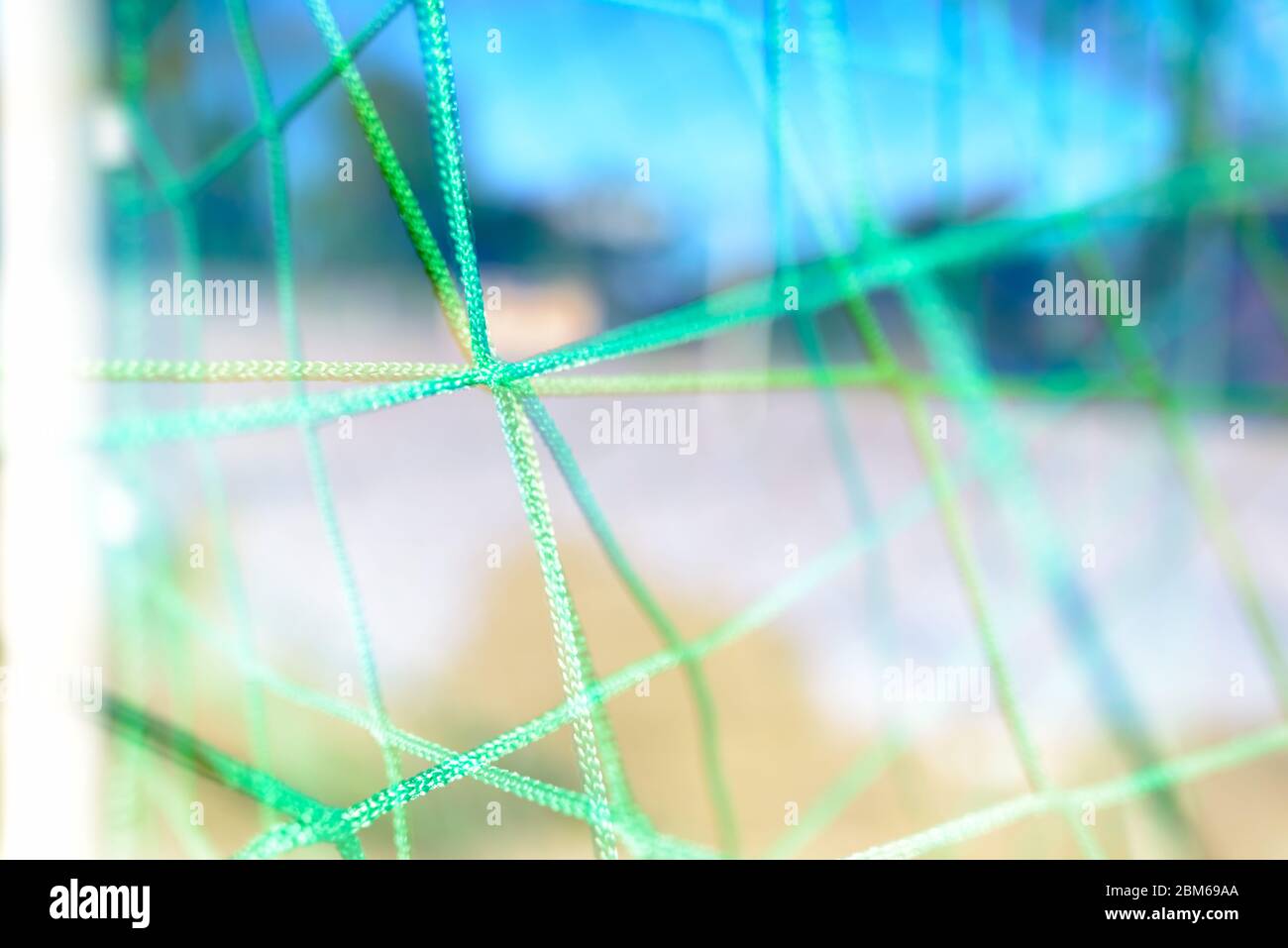 Double exposure of goal net merging together in cross patterns Stock Photo