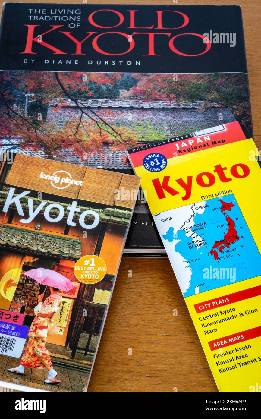 Kyoto / Japan - November 1, 2017: Various Kyoto travel guides spread on the table. Planning journey to Kyoto concept. Stock Photo