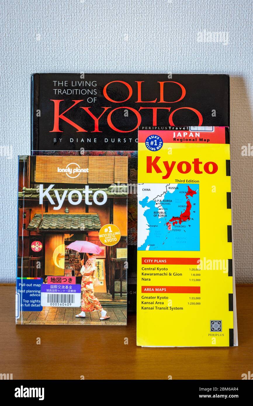 Kyoto / Japan - November 1, 2017: Various Kyoto travel guides spread on the table. Planning journey to Kyoto concept. Stock Photo