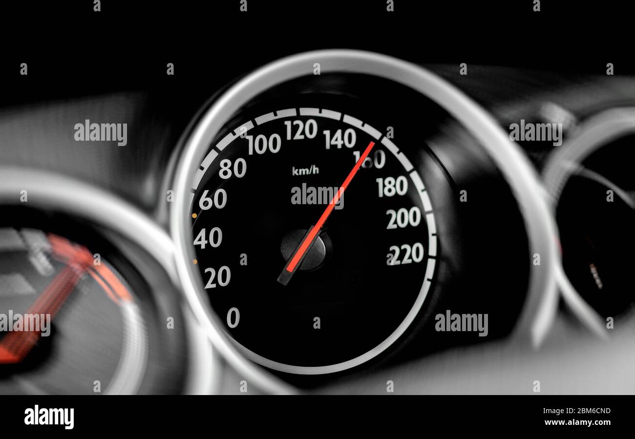 High speed on a car speedometer and motion blur Stock Photo Alamy