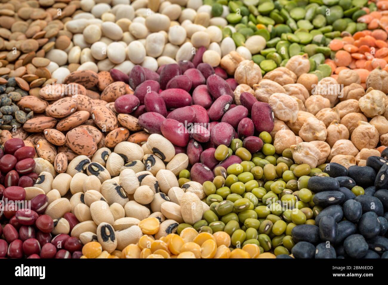 legume abstract top view of a variety of colorful bean, lentil and