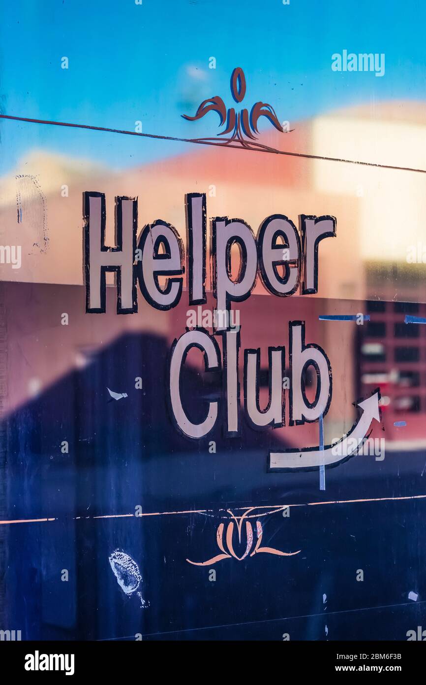 Window sign for Helper Club on Main Street in Helper, Utah, USA [Note: No property release; photograph available for editorial licensing only] Stock Photo
