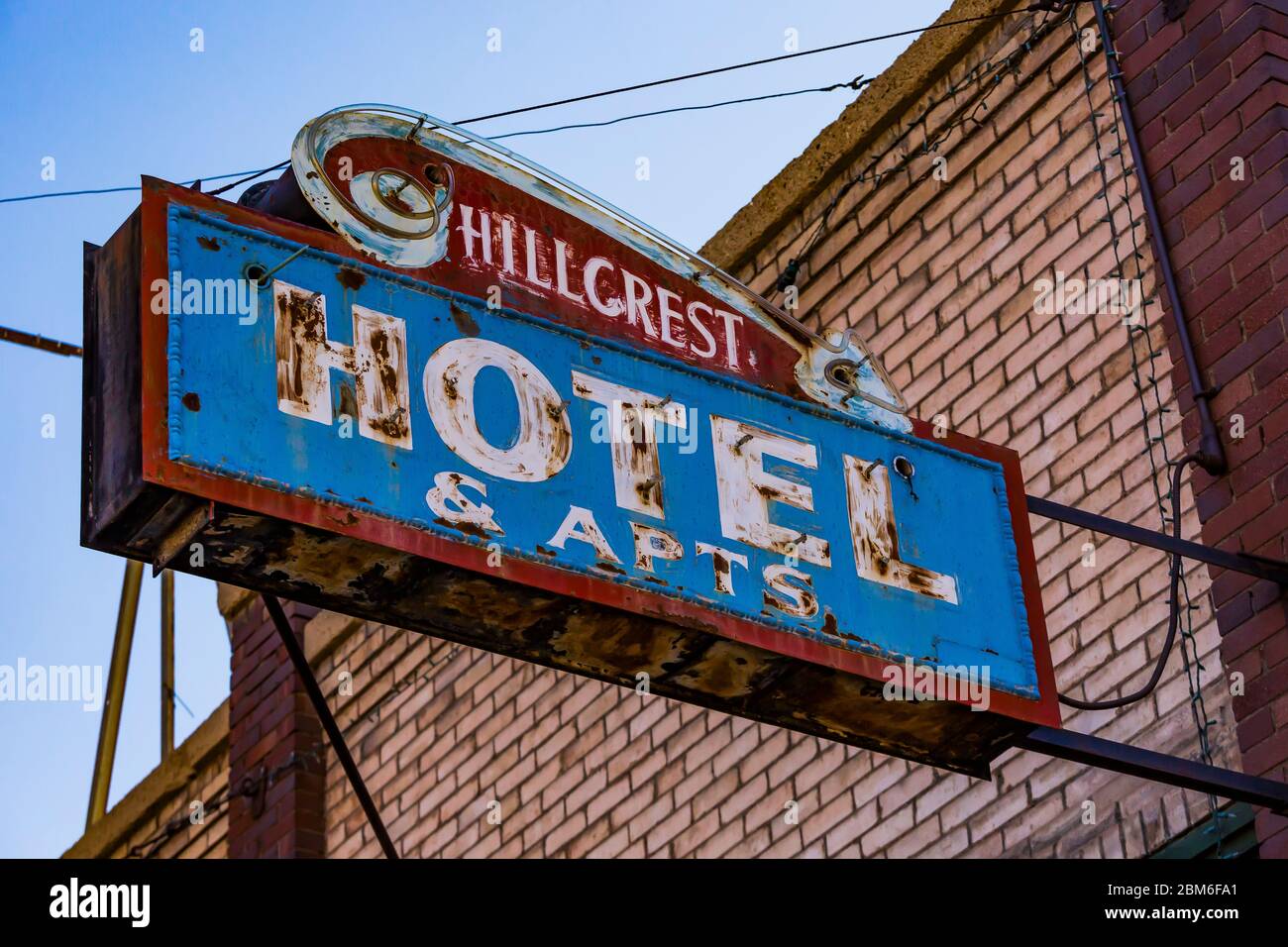Sign for Hillcrest Hotel & Apts. on Main Street, before the sign was