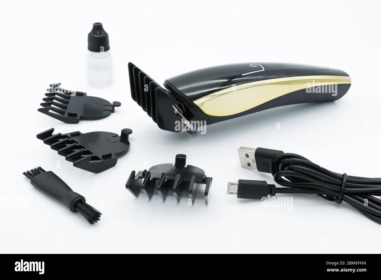 A set of the cordless electric hair clipper isolated on the white