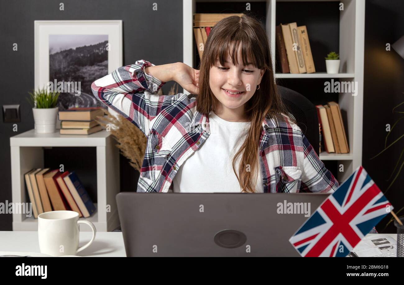 Teenage girl looking laptop screen Stock Photo