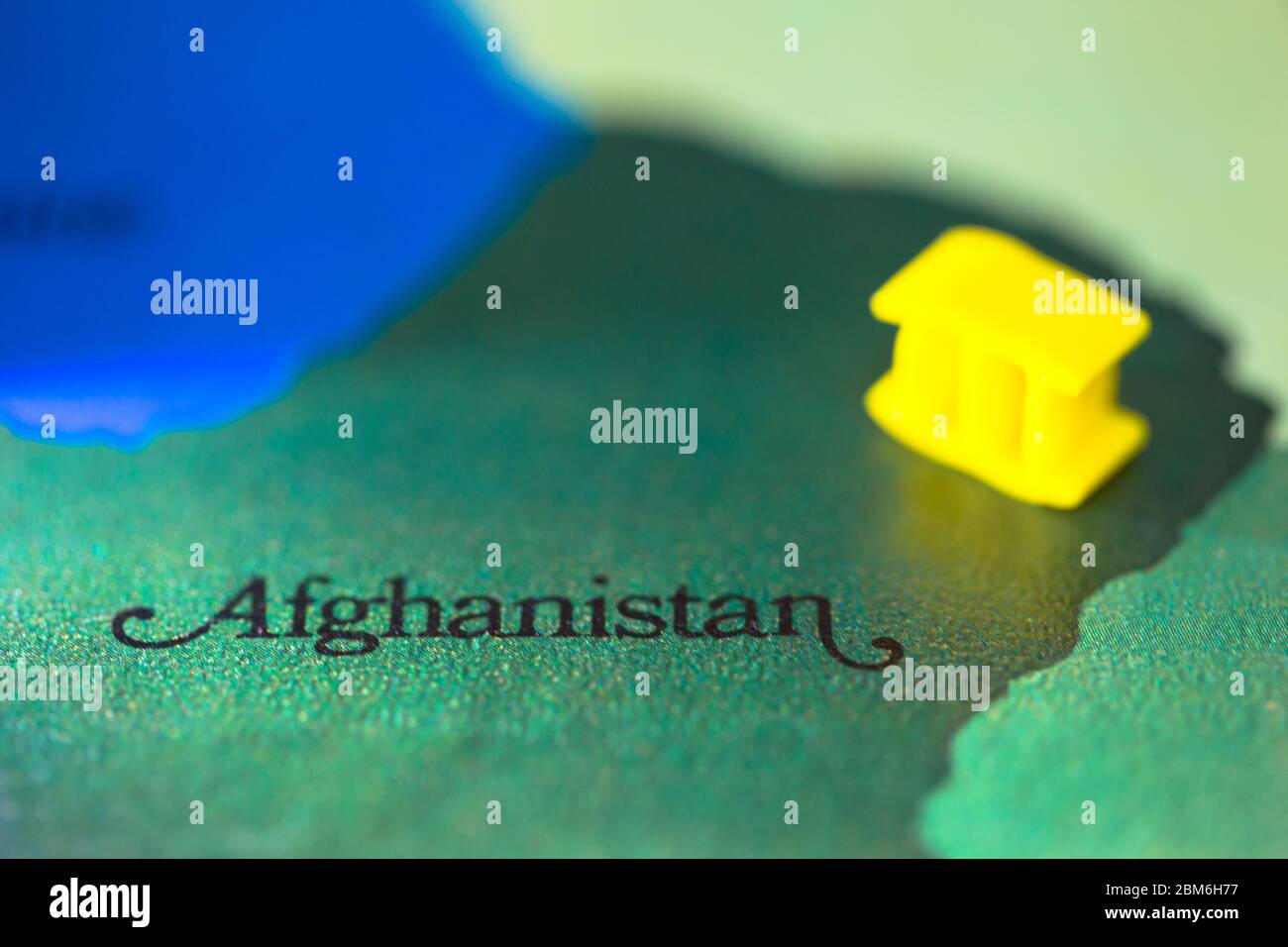 Shallow depth of field focus on geographical map location of country Afghanistan in Asia continent on atlas Stock Photo