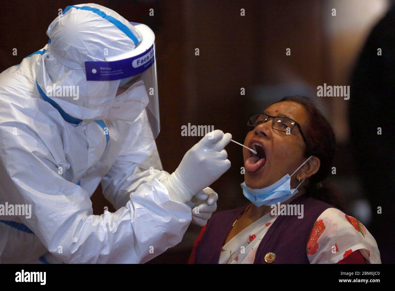 Kathmandu, Nepal. 7th May, 2020. A Nepalese lawmaker takes polymerase