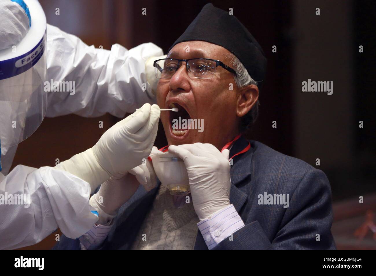 Kathmandu, Nepal. 7th May, 2020. A Nepalese lawmaker takes polymerase