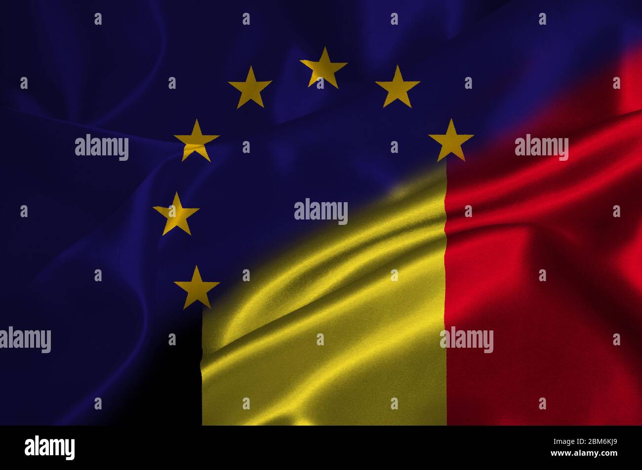 EU flag and Belgium flag on satin texture. Stock Photo