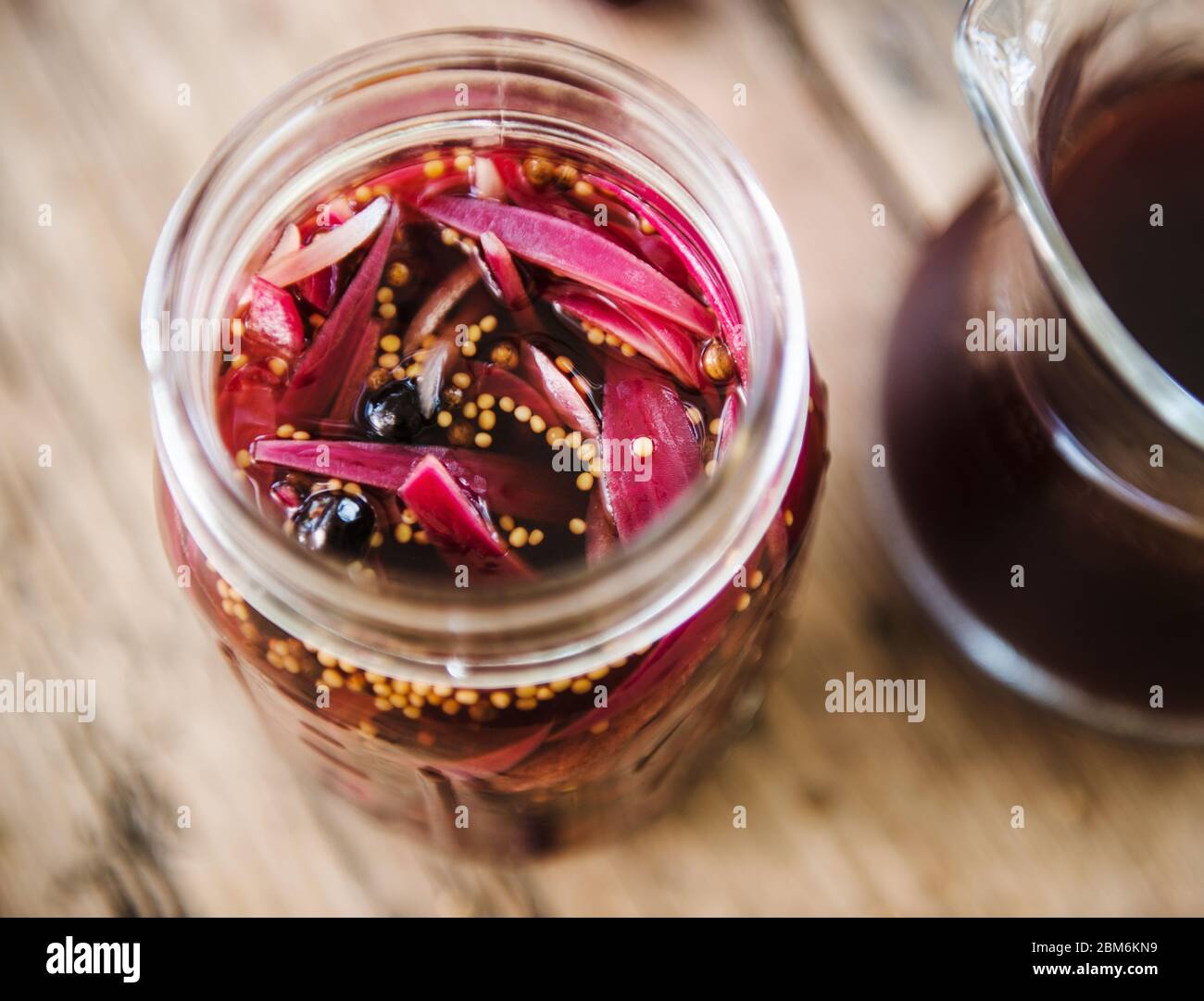Pickled onions with mustard seeds Stock Photo Alamy