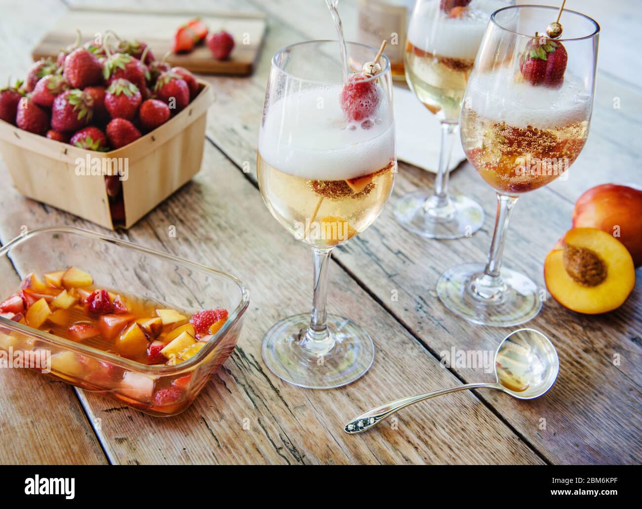 White Sangria with berries Stock Photo Alamy