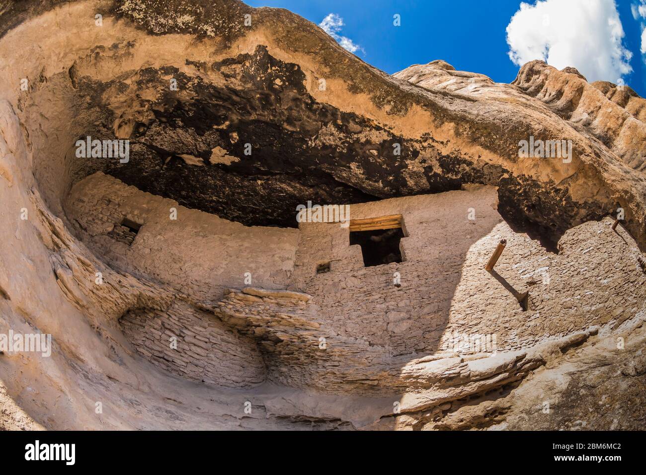 Cave cliff dwellings of ancient Mogollon Pueblo people in Gila Cliff Dwellings National Monument, New Mexico, USA Stock Photo