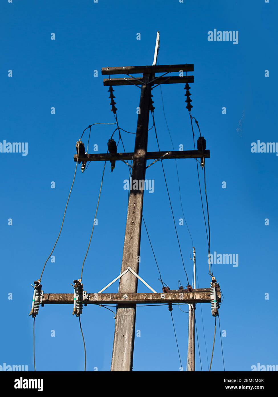 electric pole power lines and wires with blue sky Stock Photo - Alamy