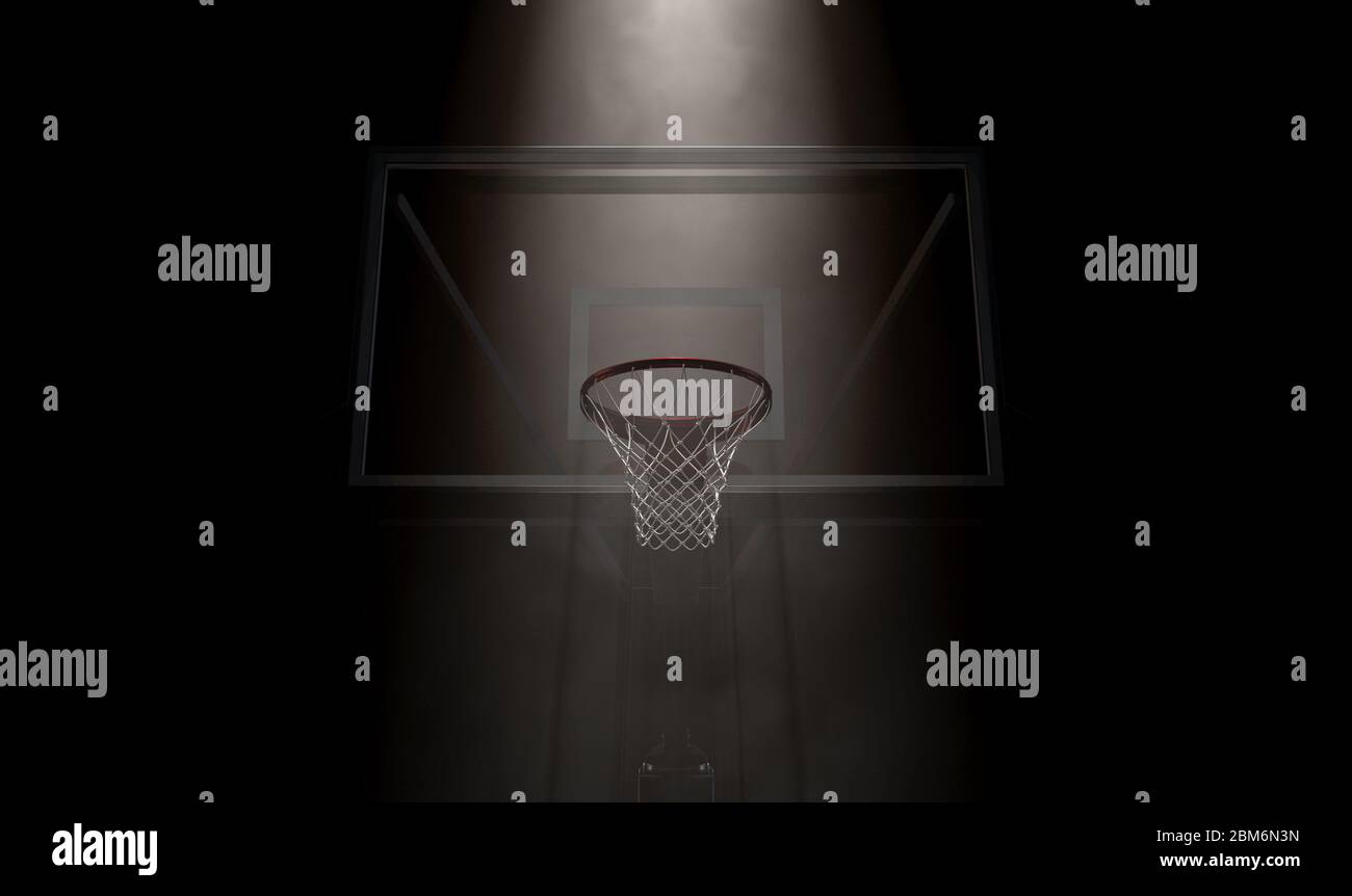 A concept showing a regular basketball hoop dramatically spotlit from above on an isolated dark background - 3D render Stock Photo