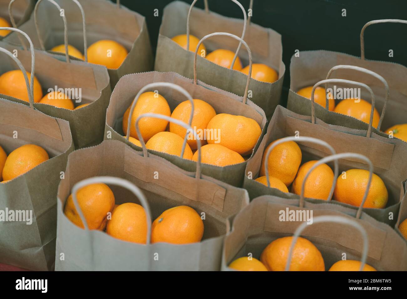 Set of Mandarins or oranges pun in the brown paper bag for sale Stock Photo  - Alamy